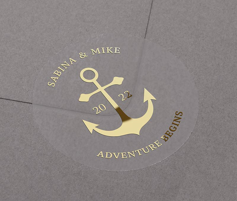 Anchor graphic and personalised names foil printed on round clear wedding sticker
