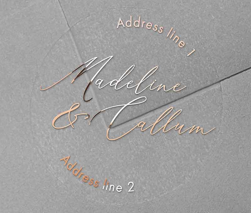 Return address labels printed in rose gold on clear round sticker with names in script font
