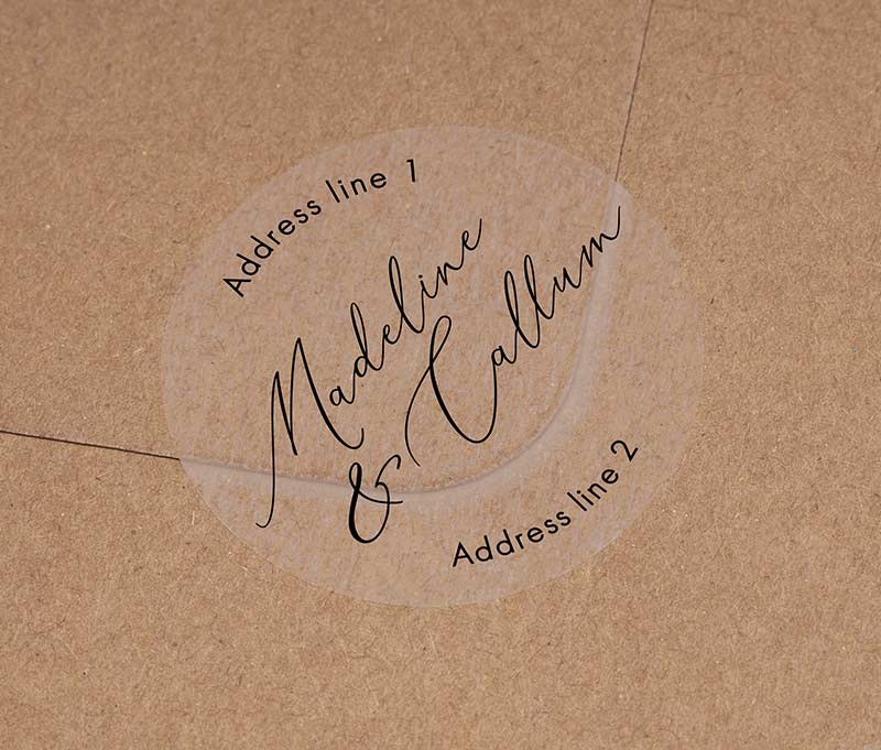 Return address labels printed in black on clear round sticker with names in cursive font