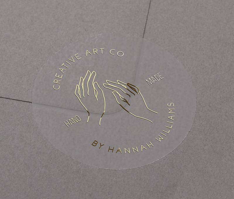 Personalized Handmade business stickers with custom text curved on top and bottom of the sticker printed in gold foil