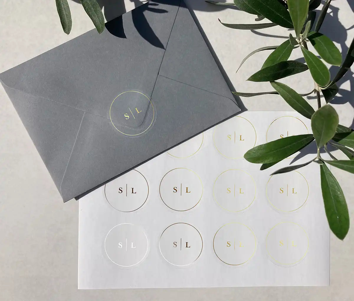 Minimalist Wedding envelope sticker sheet with personalized initials printed on clear round label