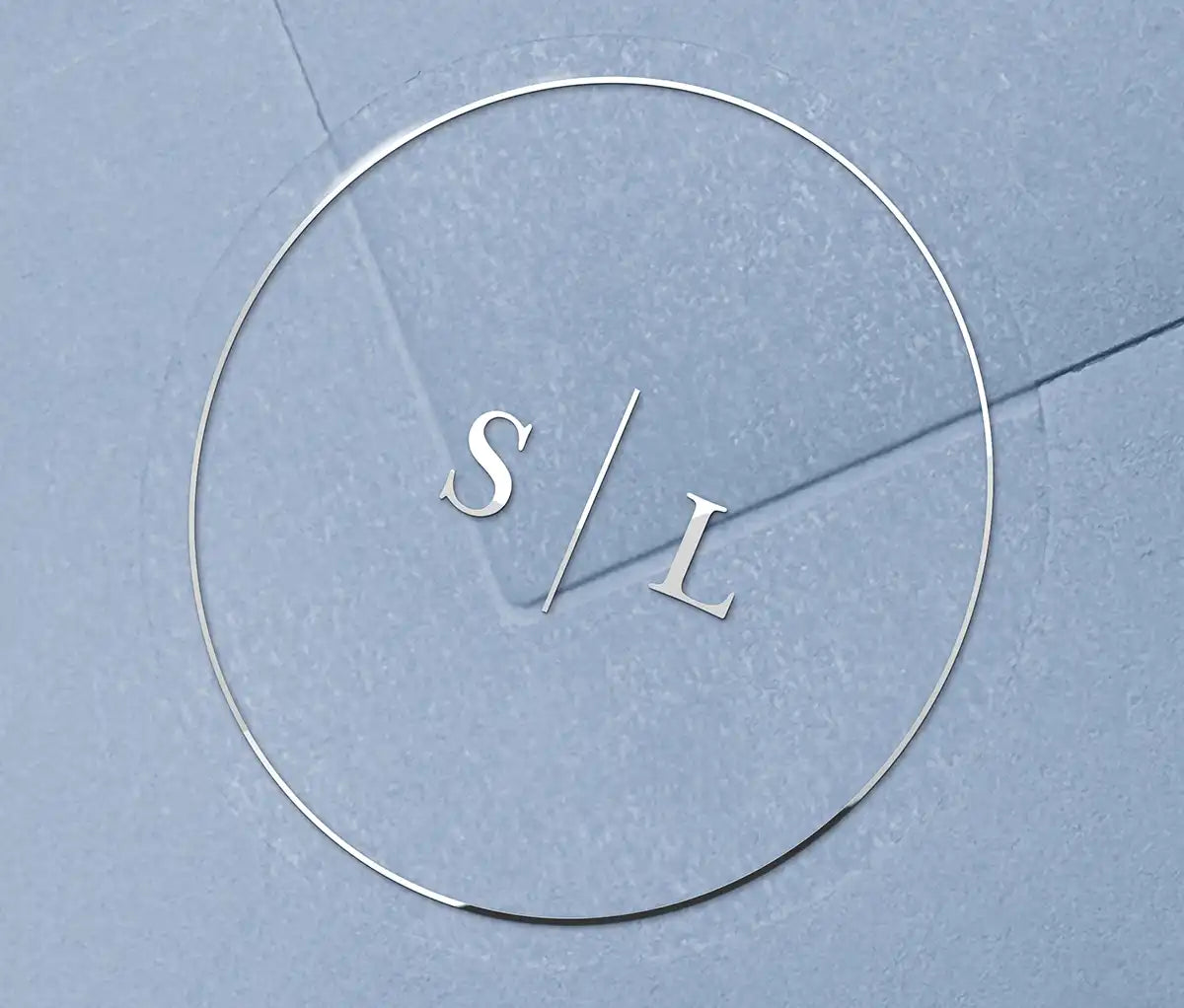 Minimalist Wedding envelope stickers with personalized initials printed in silver on clear round label