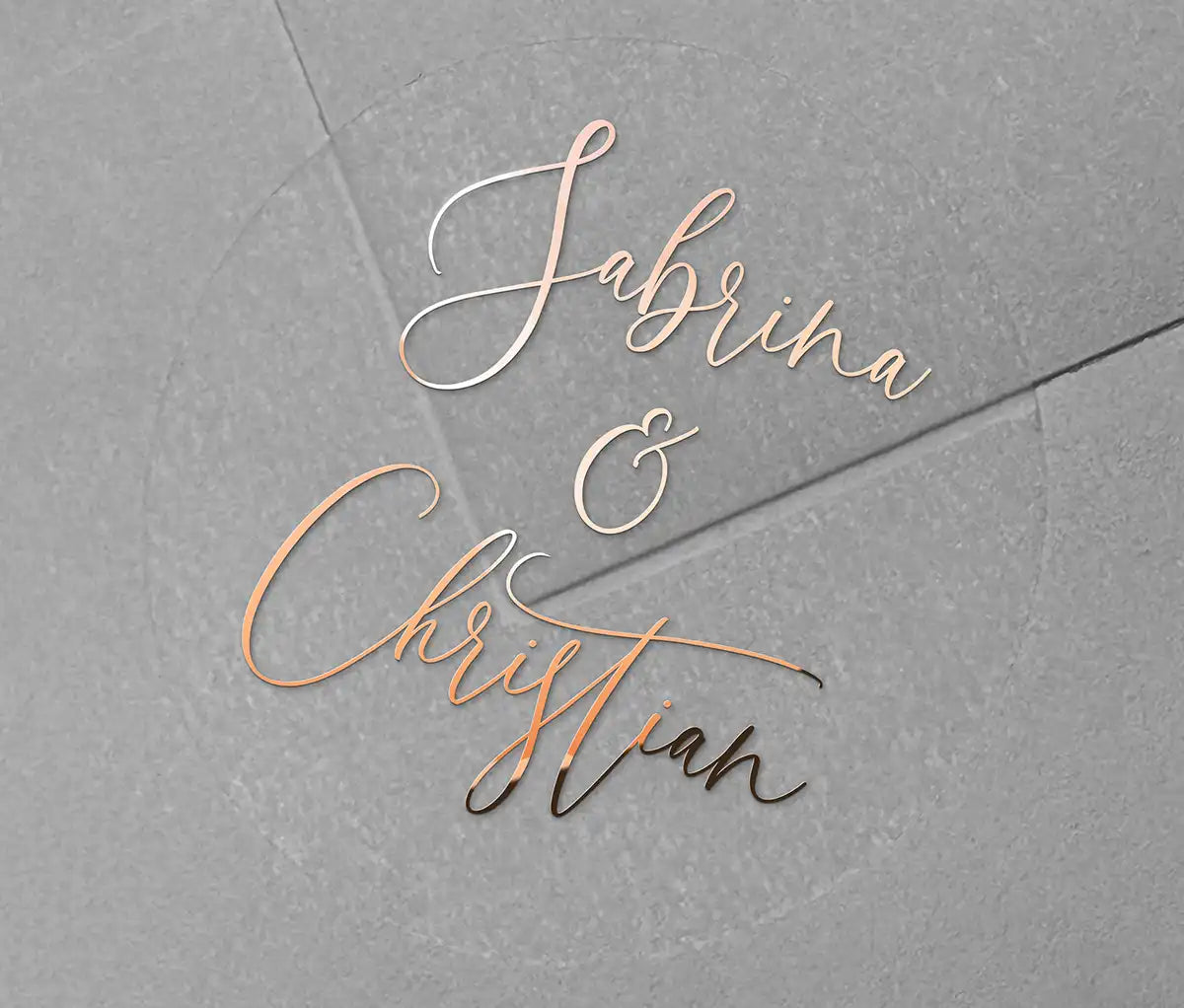 Wedding favor stickers with personalized names printed in rose gold foil on clear round sticker