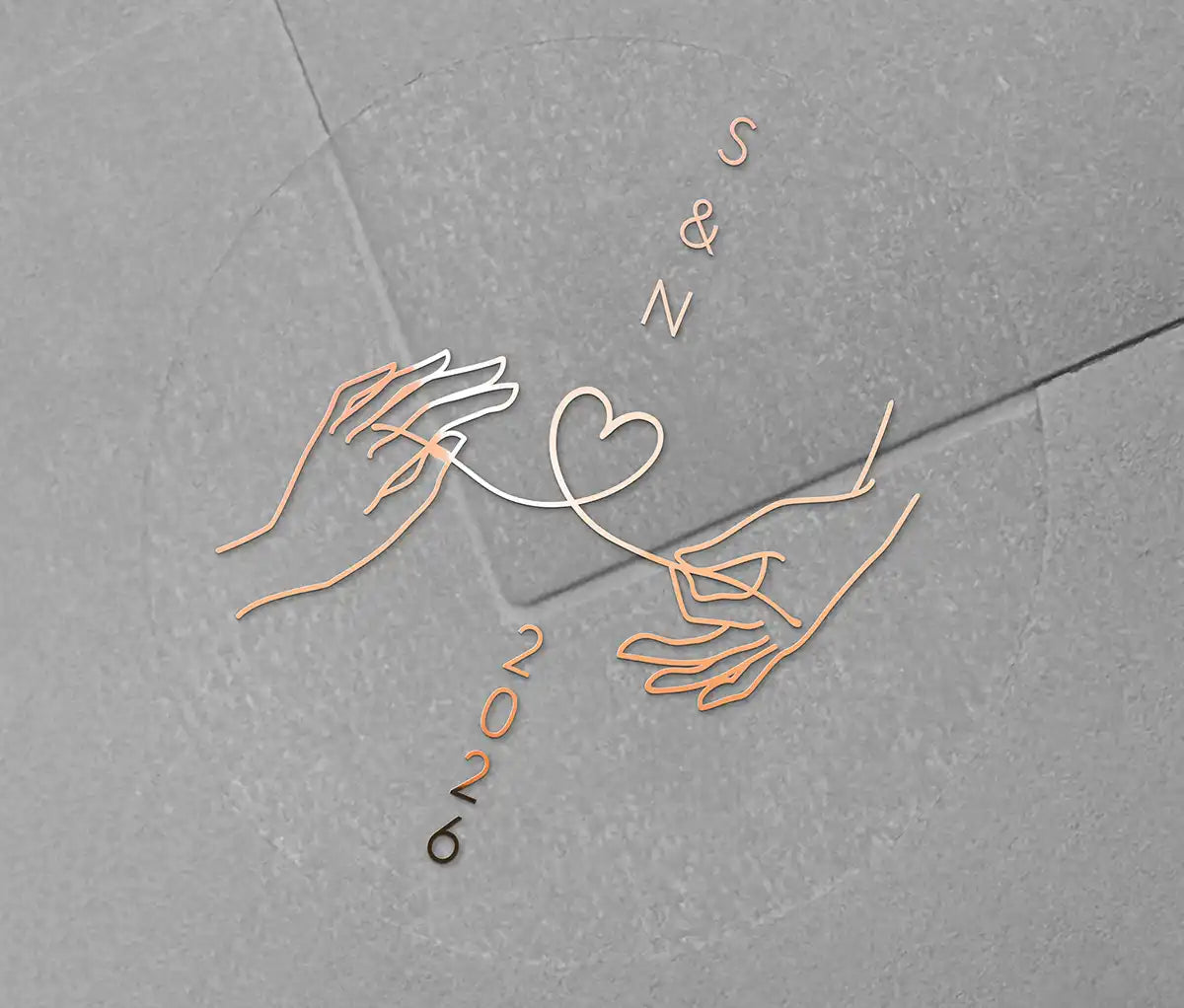 Wedding envelope seal with personalised initials printed on clear sticker in rose gold foil