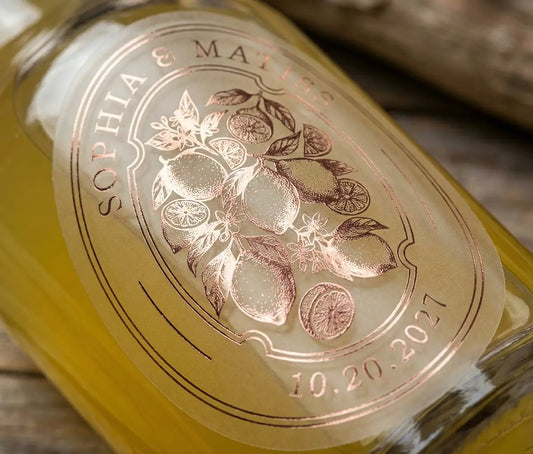 Limoncello bottle with frosted wedding favor label printed in rose gold foil.