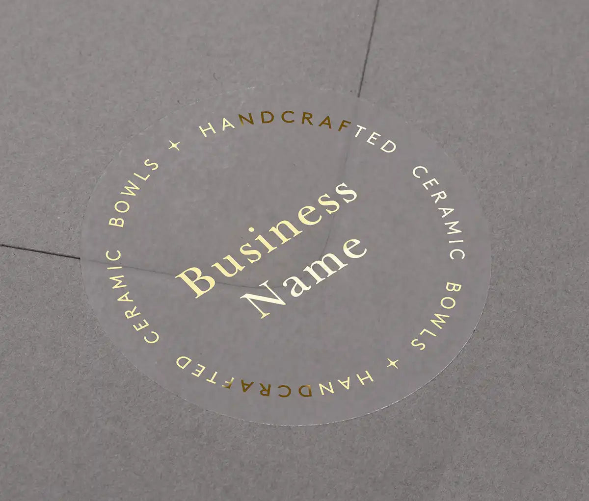 Custom Business name printed in gold on clear sticker