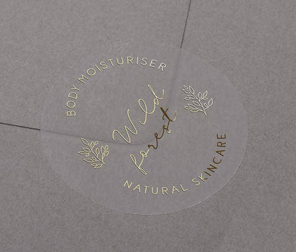 Personalised text for business name and custom text curved on top and bottom of round clear sticker printed in gold foil
