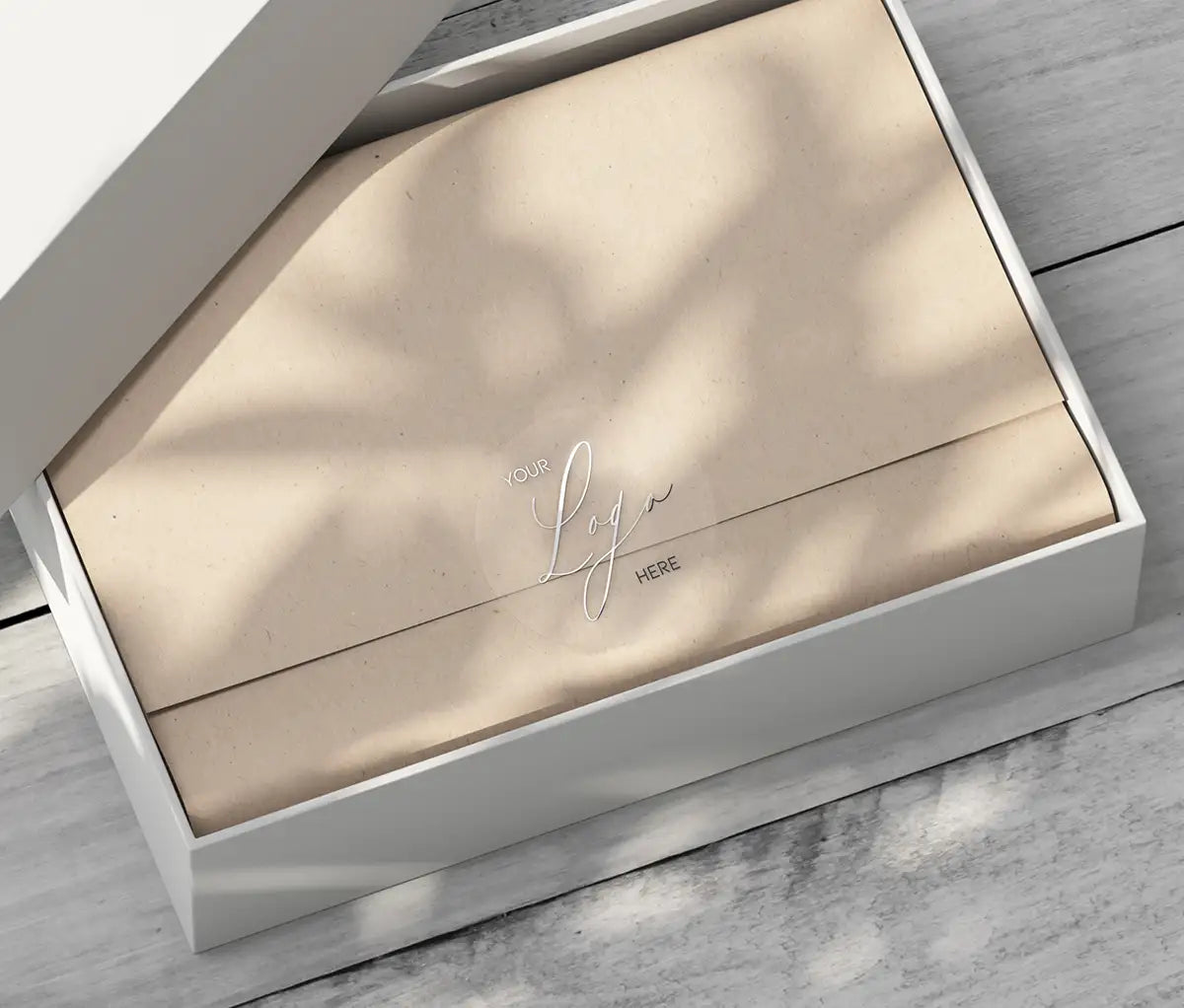 Silver foil printed custom business logo on clear round sticker applied on packaging