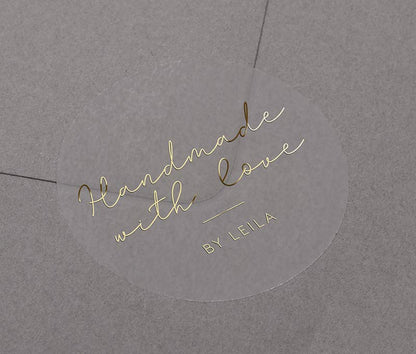 Handmade With Love sticker with personalized name printed in gold on round clear sticker