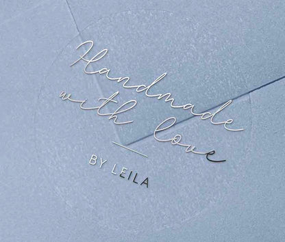 Handmade With Love sticker with personalized name printed in silver on round clear sticker