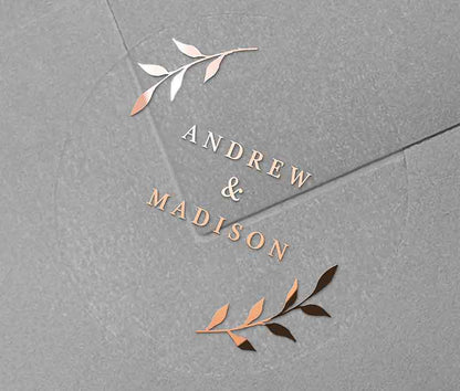 Wedding envelope sticker with personalized names and laurel leaves graphic printed in rose gold on round transparent frosted label