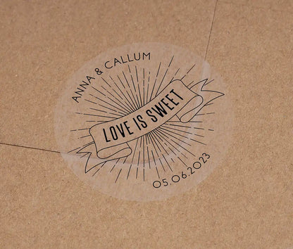 Love is sweet wedding favor sticker with personalized names and date printed in black on clear sticker