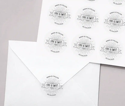 Love is sweet wedding favor sticker sheet with personalized names and date printed in black on clear sticker sheet