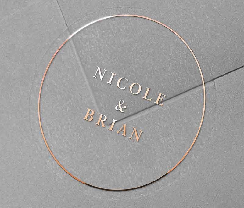 Rose gold wedding envelope sticker with personalized names printed on round transparent frosted label