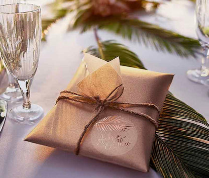 Tropical wedding envelope sticker applied to a party favor