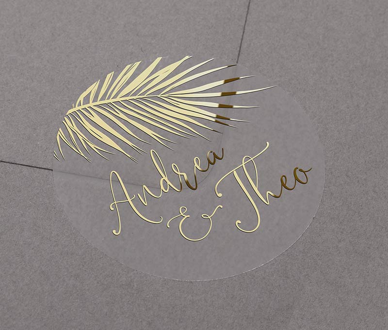 Tropical Wedding envelope sticker with personalized names and palm leaf graphic printed on round transparent frosted label