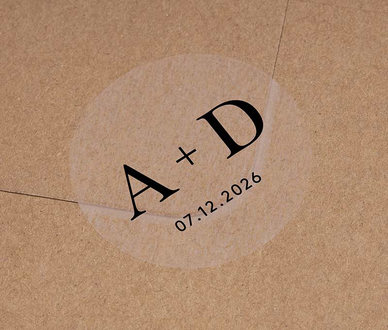 Clear wedding envelope stickers with personalized initials and date printed in black