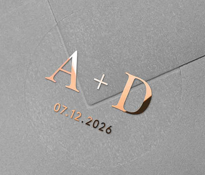 Transparent wedding envelope seal with personalized rose gold foiled initials and date