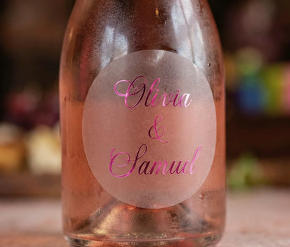 Rose wine bottle with personalized frosted label printed in hot pink foil