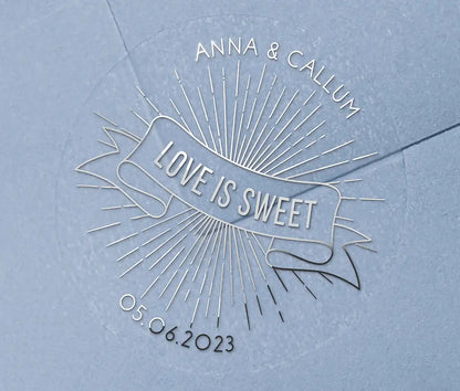 Love is sweet wedding favor sticker with personalized names and date printed in silver on clear sticker