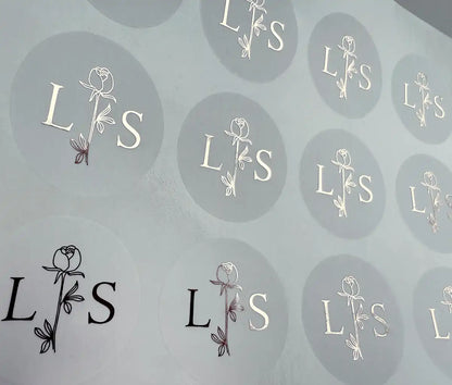 Personalised initials and floral rose graphic printed in silver on clear sticker sheet
