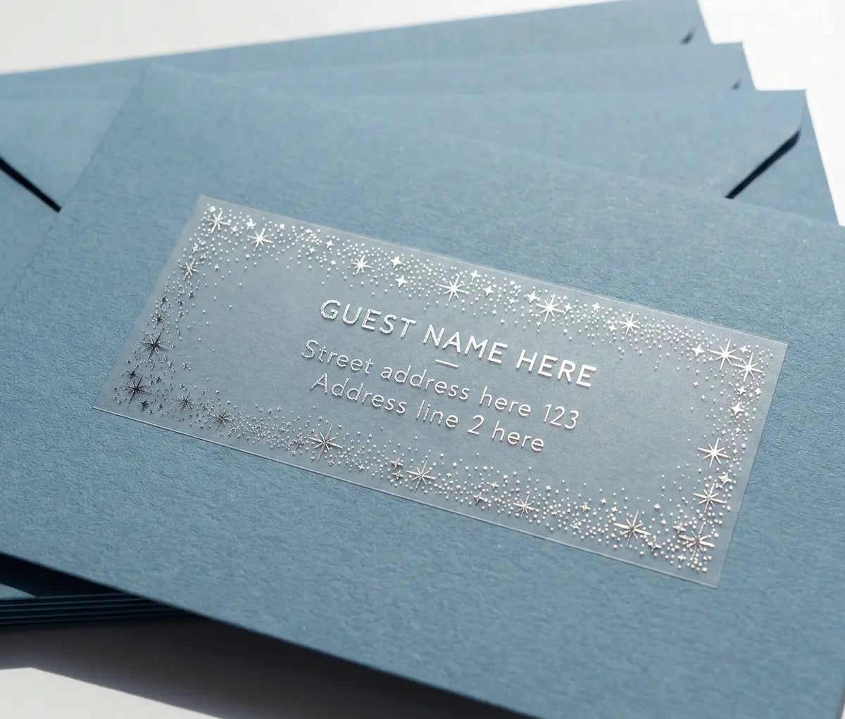Blue envelope with a clear guest address label and starry frame