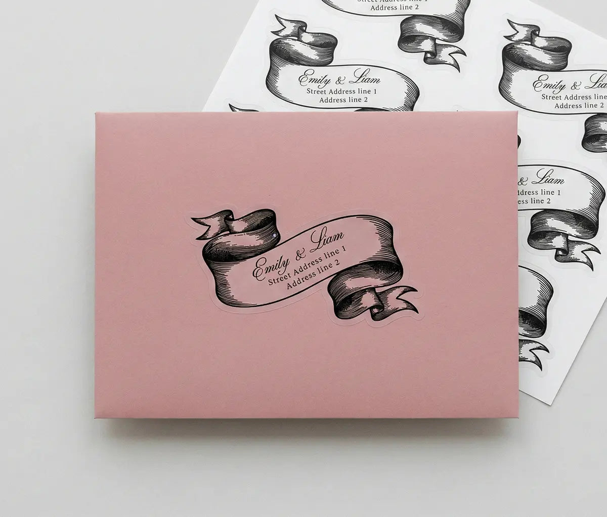 Pink envelope with personalized return address staicker