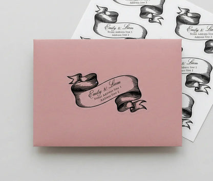 Pink envelope with personalized return address staicker